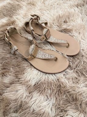 GUESS Beige Monogram T-Strap Sandals with Gold Accents